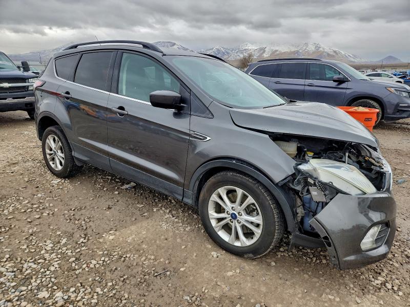 Photo 4 from auction – 2017 FORD ESCAPE SE with VIN 1FMCU9GD2HUC50175