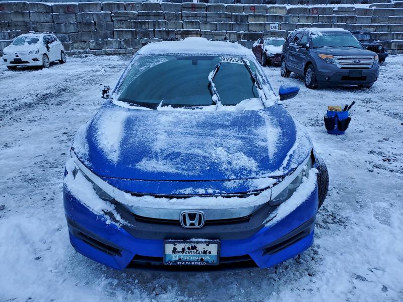 Photo 5 from auction – 2017 HONDA CIVIC LX with VIN 2HGFC2F57HH564690