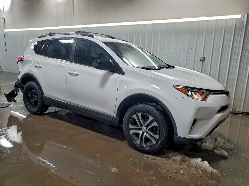 Photo 4 from auction – 2017 TOYOTA RAV4 LE with VIN JTMBFREV0HJ147943