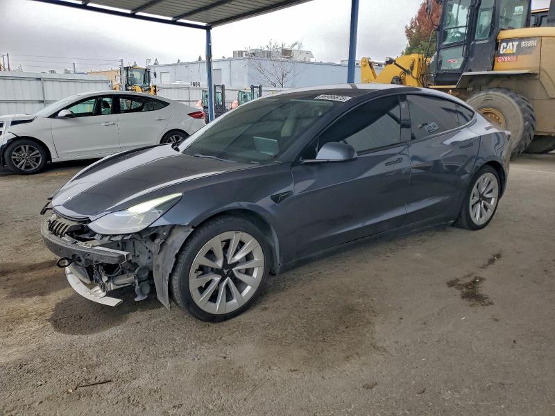 TESLA MODEL 3 2022 with VIN 5YJ3E1EAXNF142712 - Photo from auction
