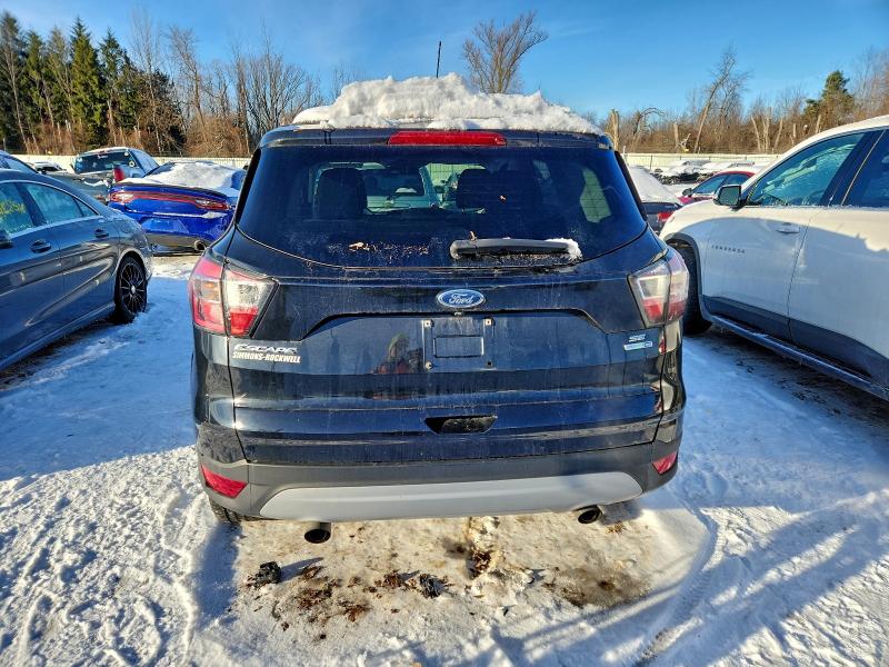 Photo 6 from auction – 2017 FORD ESCAPE SE with VIN 1FMCU9G95HUA89395