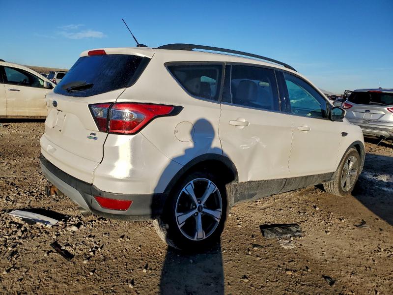 Photo 3 from auction – 2017 FORD ESCAPE SE with VIN 1FMCU9G90HUE36177