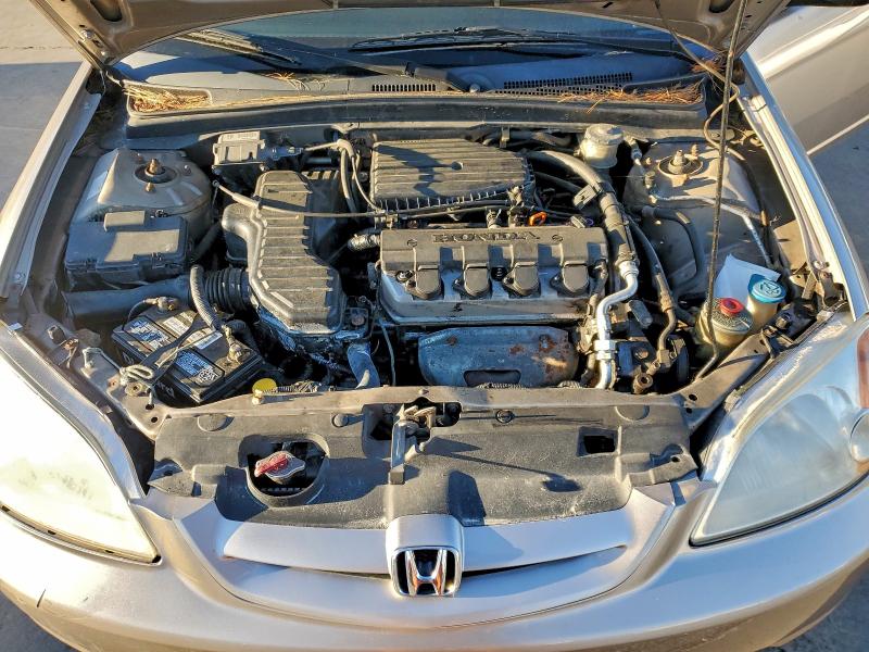 Photo 11 from auction – 2002 HONDA CIVIC LX with VIN 1HGEM22532L056791