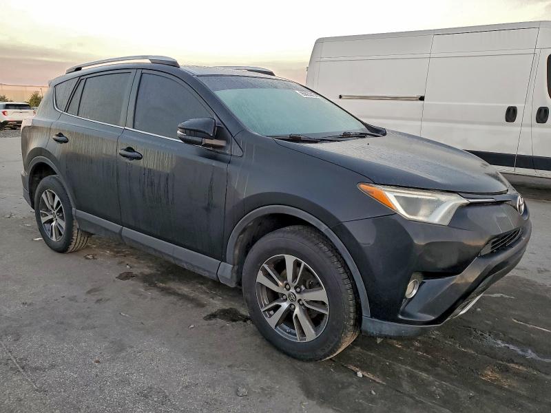 Photo 4 from auction – 2016 TOYOTA RAV4 XLE with VIN 2T3WFREV1GW237135