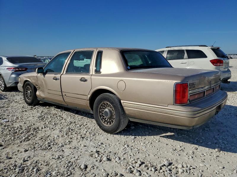 Photo 2 from auction – 1997 LINCOLN TOWN CAR E with VIN 1LNLM81W6VY699822