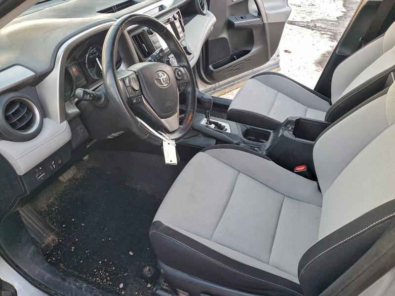 Photo 7 from auction – 2018 TOYOTA RAV4 HV LE with VIN JTMRJREV2JD251027