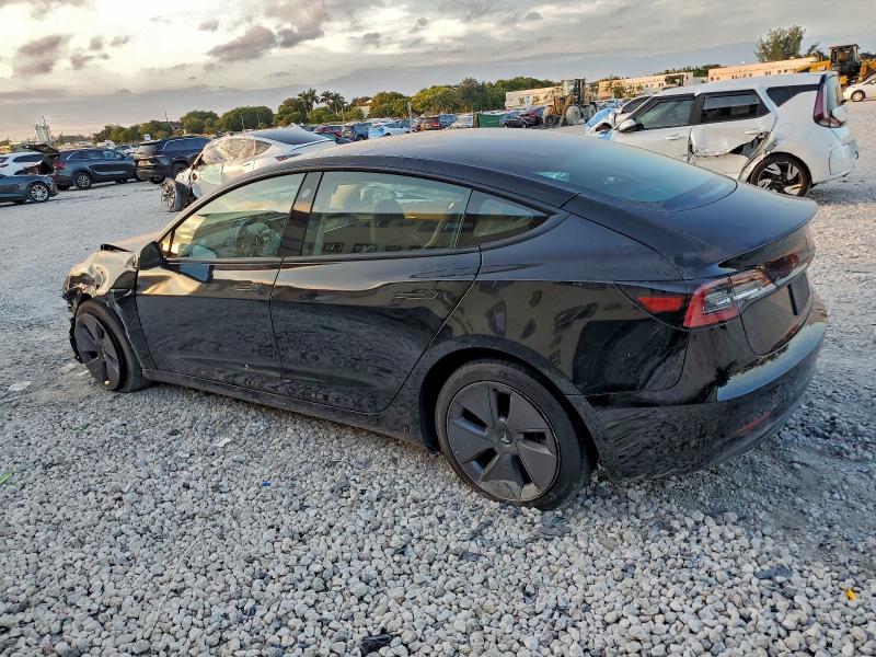 Photo 2 from auction – 2023 TESLA MODEL 3 with VIN 5YJ3E1EA3PF487499