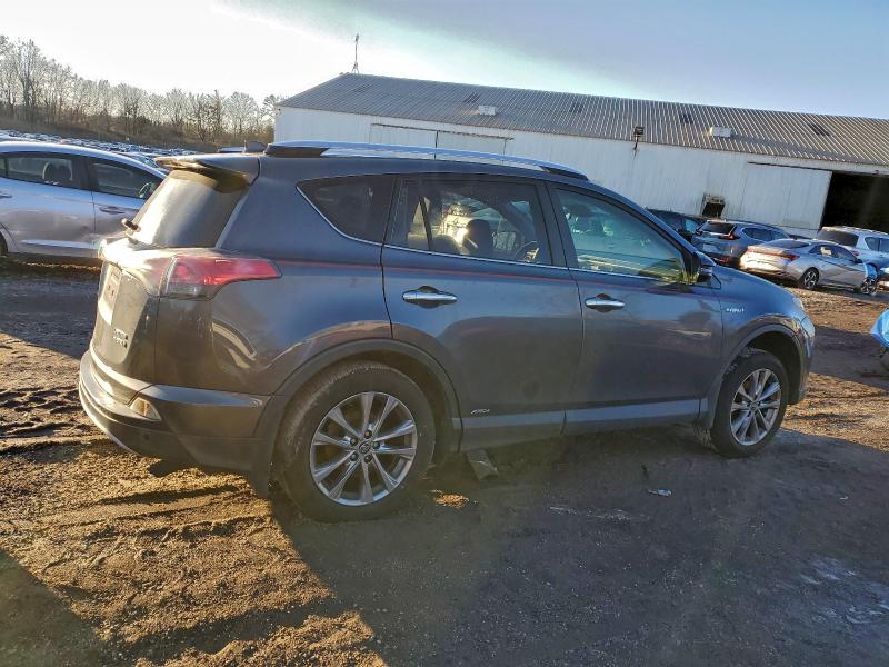 Photo 3 from auction – 2016 TOYOTA RAV4 HV LI with VIN JTMDJREV2GD034290