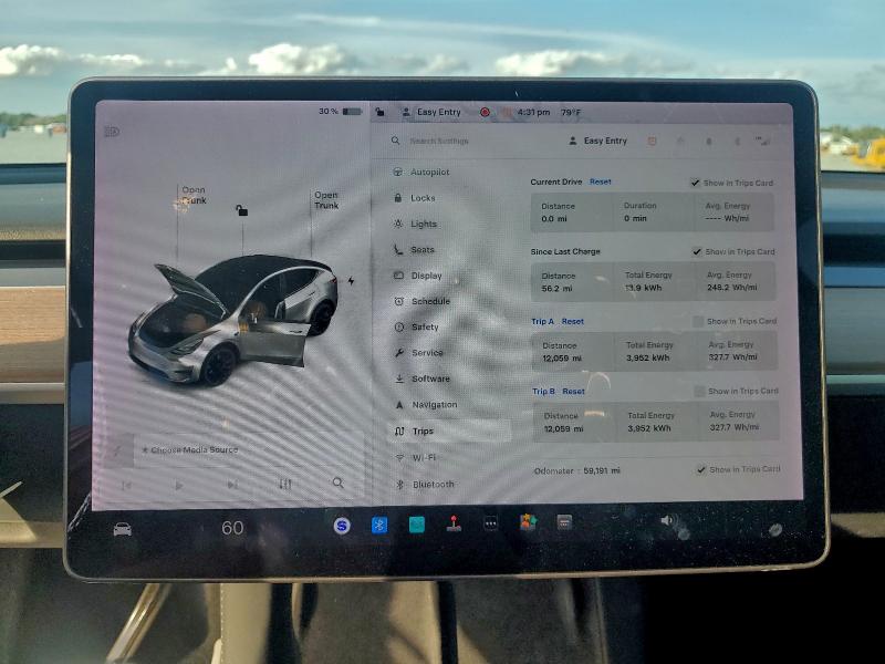 Photo 9 from auction – 2021 TESLA MODEL Y with VIN 5YJYGDEFXMF259315