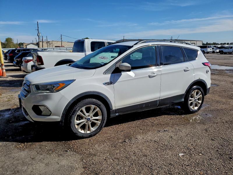 FORD ESCAPE 2018 with VIN 1FMCU9HD7JUD08334 - Photo from auction