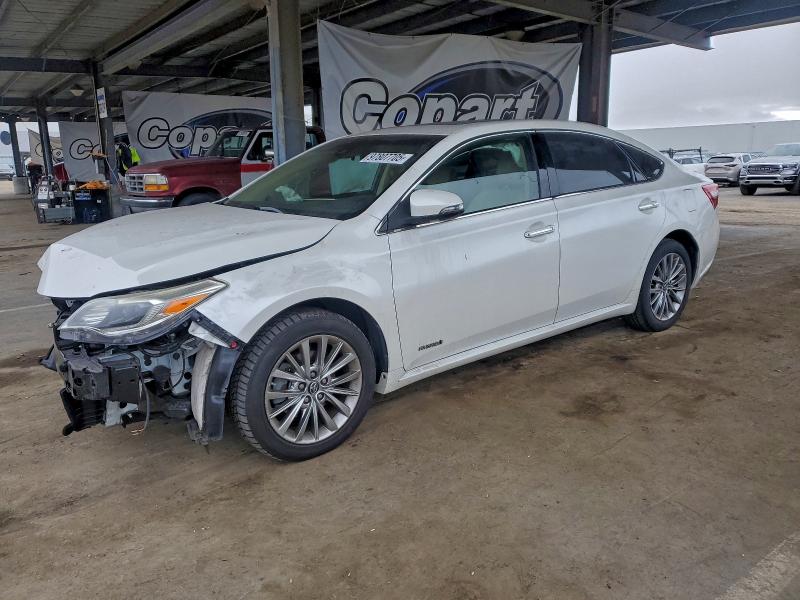 TOYOTA AVALON HYB 2018 with VIN 4T1BD1EB9JU062919 - Photo from auction