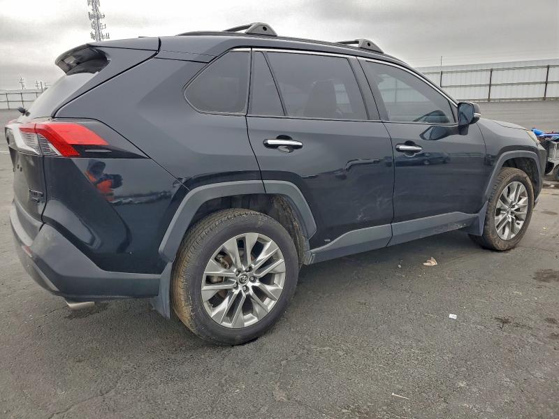 Photo 3 from auction – 2019 TOYOTA RAV4 with VIN JTMN1RFVXKD509017