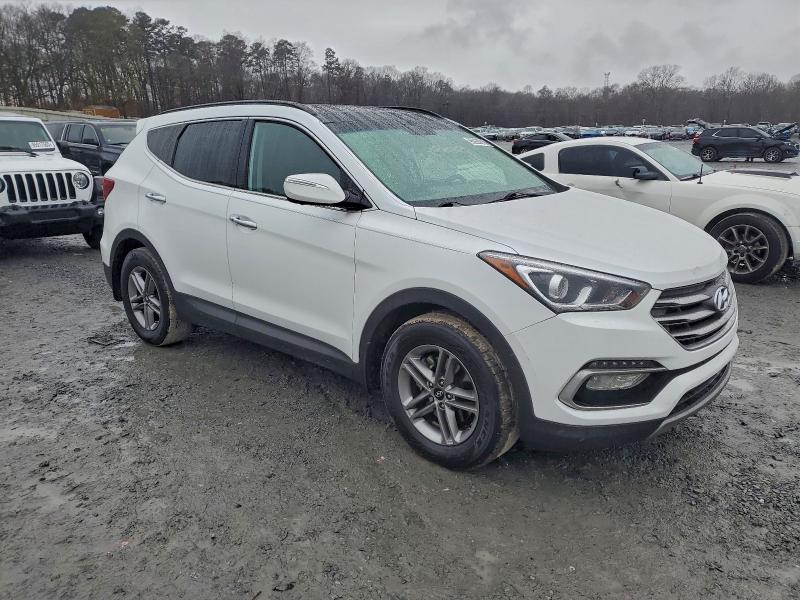 Photo 4 from auction – 2017 HYUNDAI SANTA FE S with VIN 5NMZU3LB7HH040985