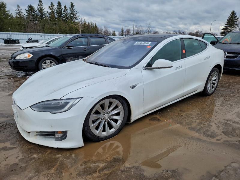 TESLA MODEL S 2016 with VIN 5YJSA1E21GF151012 - Photo from auction