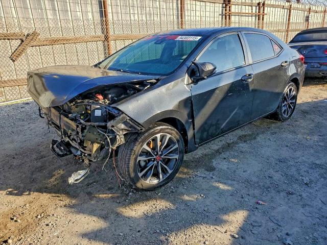 TOYOTA COROLLA L 2017 with VIN 5YFBURHE6HP613825 - Photo from auction