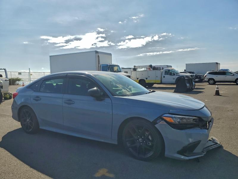 Photo 4 from auction – 2023 HONDA CIVIC SPOR with VIN 2HGFE2F54PH554000