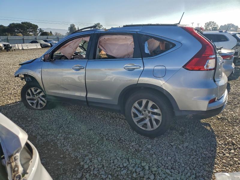 Photo 2 from auction – 2015 HONDA CR-V EXL with VIN 2HKRM3H79FH531028
