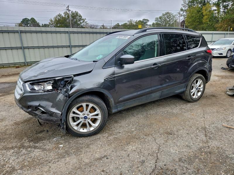 FORD ESCAPE 2018 with VIN 1FMCU0GD9JUD07747 - Photo from auction