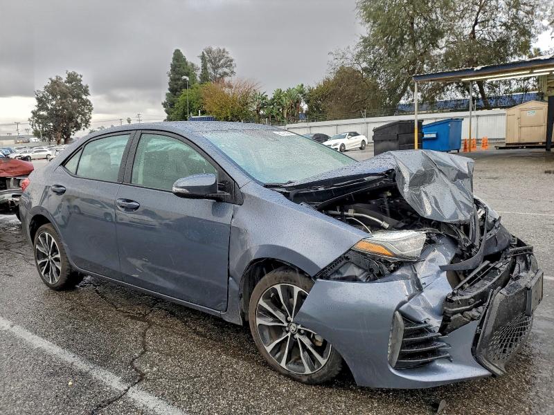 Photo 4 from auction – 2018 TOYOTA COROLLA L with VIN 5YFBURHEXJP791971