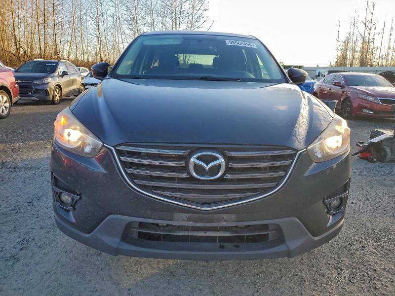 Photo 5 from auction – 2016 MAZDA CX-5 TOURI with VIN JM3KE4CY5G0774975
