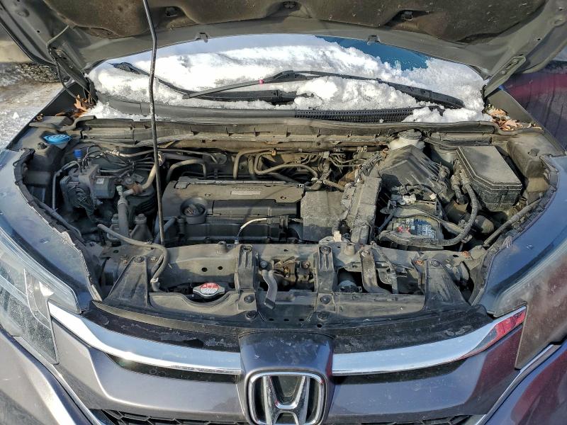 Photo 12 from auction – 2016 HONDA CR-V LX with VIN 2HKRM4H34GH651419