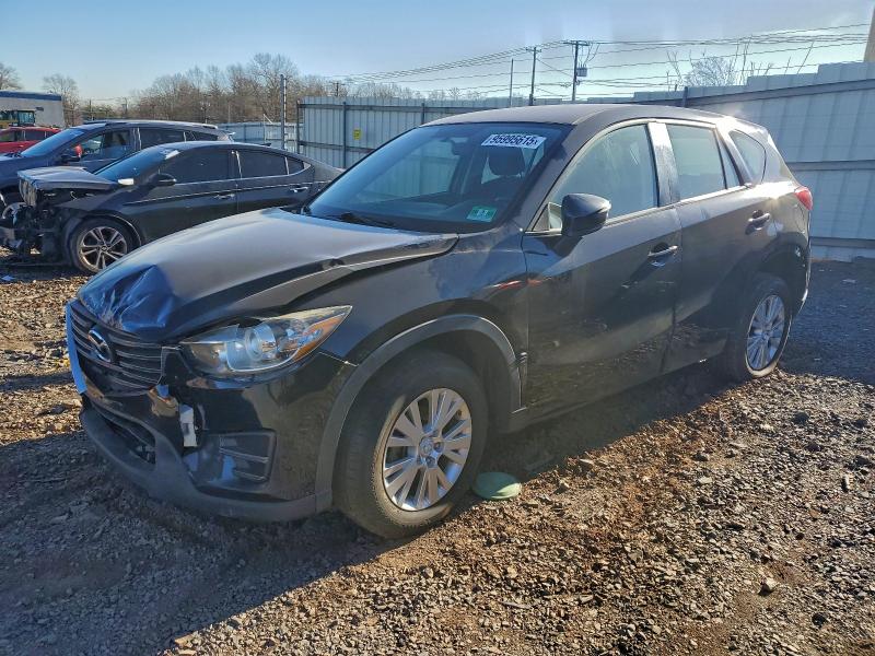 MAZDA CX-5 SPORT 2016 with VIN JM3KE4BY4G0633512 - Photo from auction