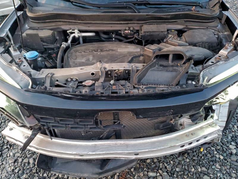 Photo 12 from auction – 2020 HONDA PASSPORT E with VIN 5FNYF8H59LB008121