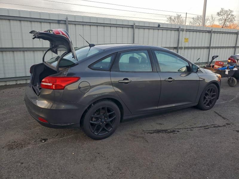 Photo 3 from auction – 2016 FORD FOCUS SE with VIN 1FADP3F29GL298912