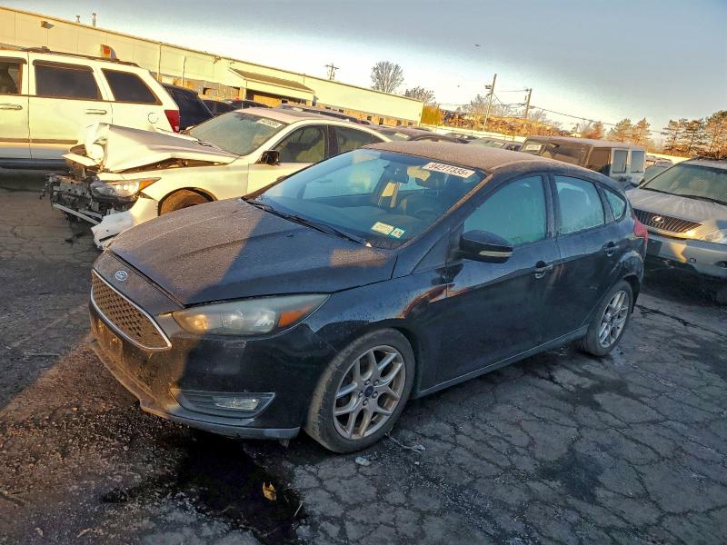FORD FOCUS SE 2015 with VIN 1FADP3K29FL372057 - Photo from auction
