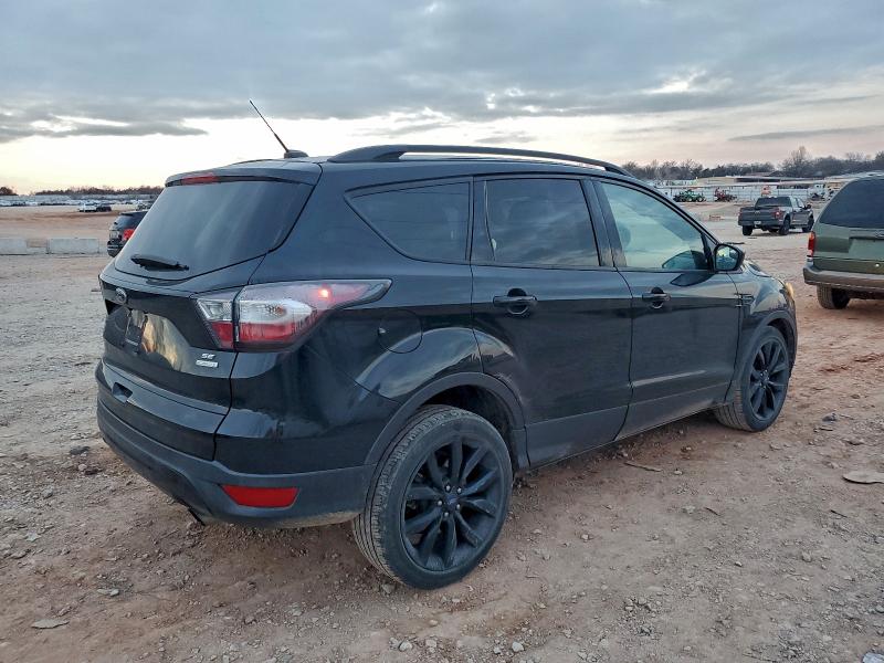 Photo 3 from auction – 2017 FORD ESCAPE SE with VIN 1FMCU0GD1HUC10374