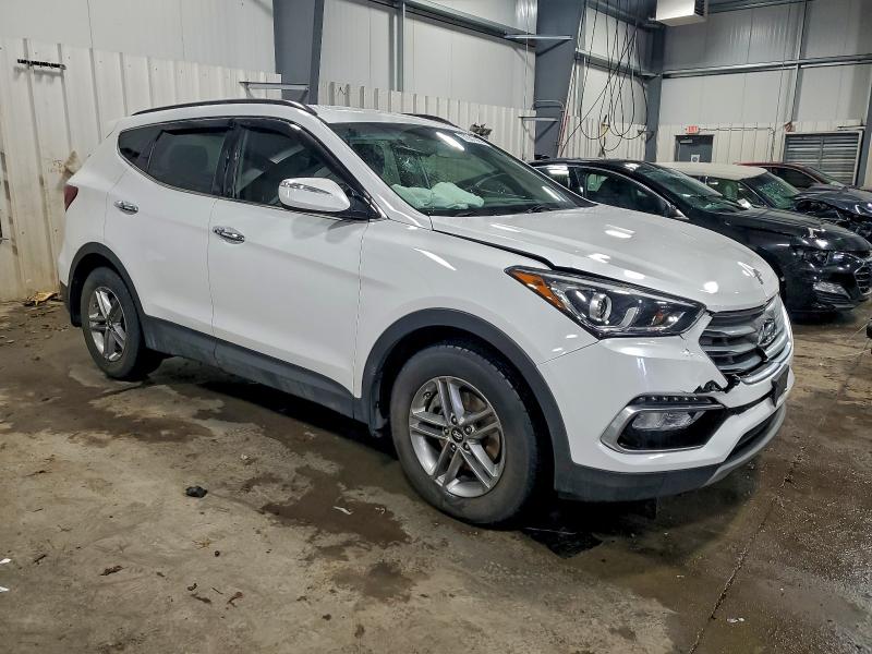 Photo 4 from auction – 2018 HYUNDAI SANTA FE S with VIN 5NMZU3LB6JH101670