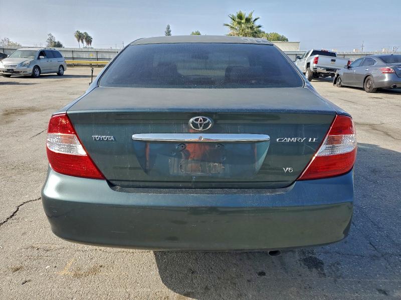 Photo 6 from auction – 2002 TOYOTA CAMRY LE with VIN 4T1BF30KX2U523446