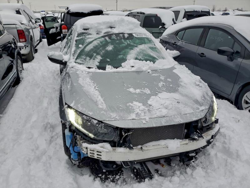 Photo 5 from auction – 2021 HONDA CIVIC SPOR with VIN 19XFC2F83ME001991