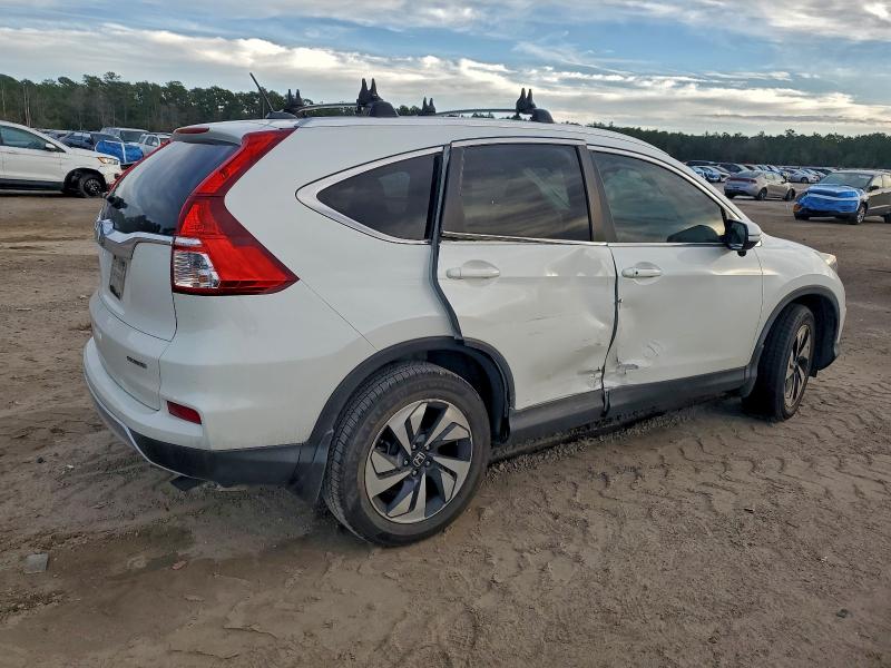 Photo 3 from auction – 2015 HONDA CR-V TOURI with VIN 5J6RM3H90FL020038