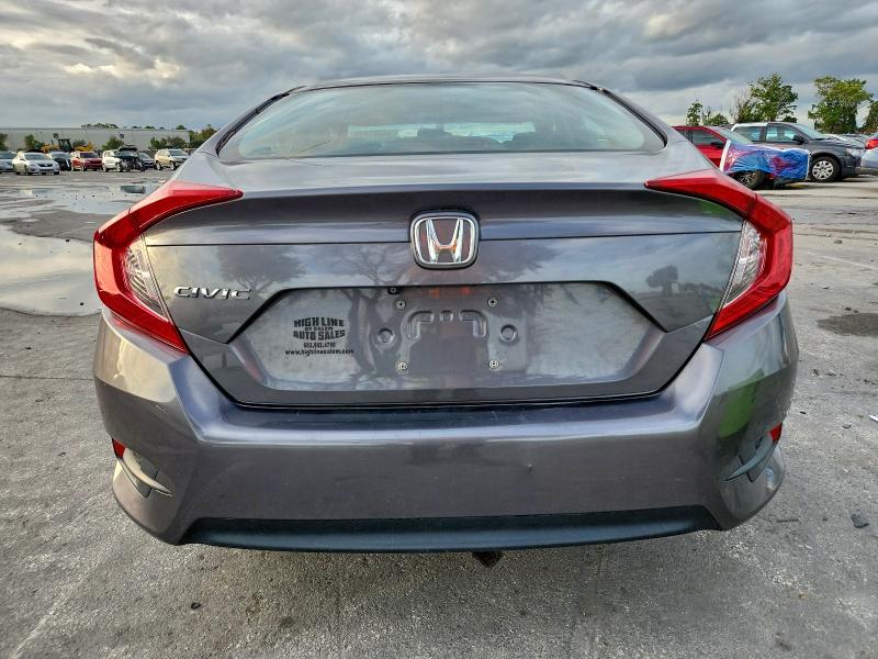 Photo 6 from auction – 2018 HONDA CIVIC with VIN 19XFC2F55JE030247