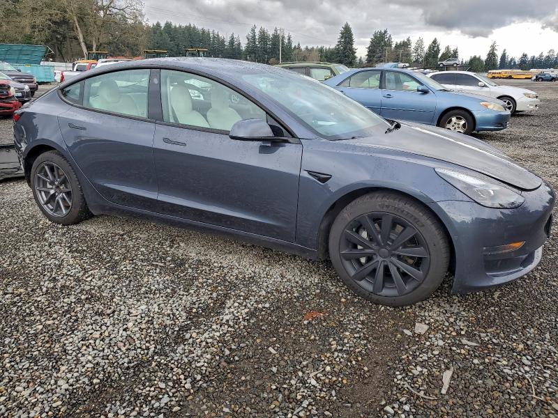 Photo 4 from auction – 2022 TESLA MODEL 3 with VIN 5YJ3E1EB5NF310684