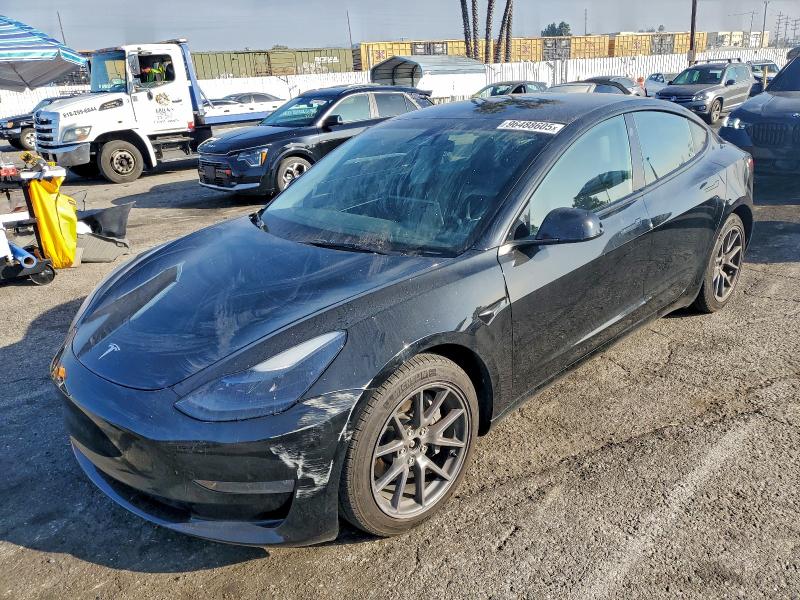 TESLA MODEL 3 2023 with VIN 5YJ3E1EB5PF628632 - Photo from auction