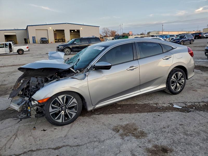 HONDA CIVIC EX 2018 with VIN JHMFC1F32JX019214 - Photo from auction