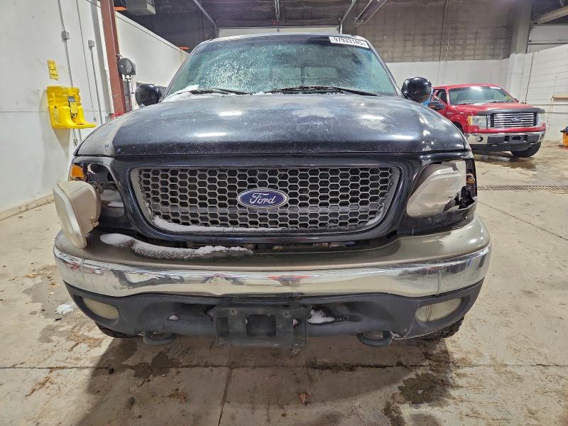 Photo 5 from auction – 2001 FORD F150 SUPER with VIN 1FTRW08L01KB20620