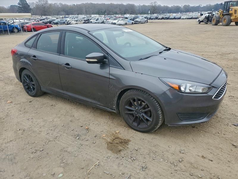 Photo 4 from auction – 2015 FORD FOCUS SE with VIN 1FADP3F28FL276253