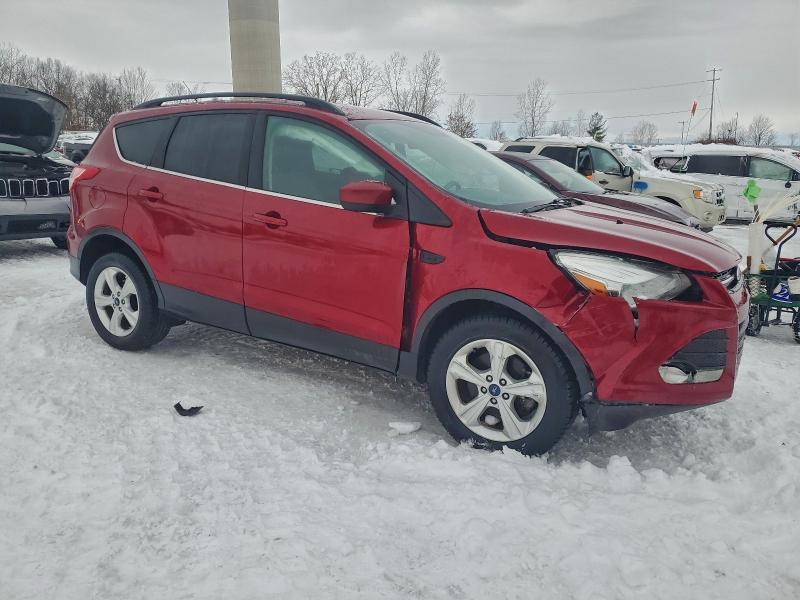 Photo 4 from auction – 2016 FORD ESCAPE SE with VIN 1FMCU9GX1GUC77926