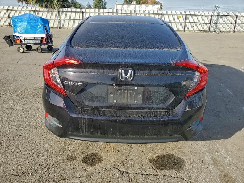 Photo 6 from auction – 2016 HONDA CIVIC LX with VIN 2HGFC2F55GH501604