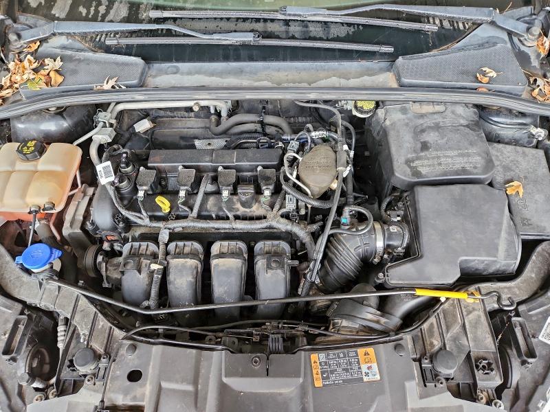 Photo 11 from auction – 2015 FORD FOCUS SE with VIN 1FADP3F24FL254492
