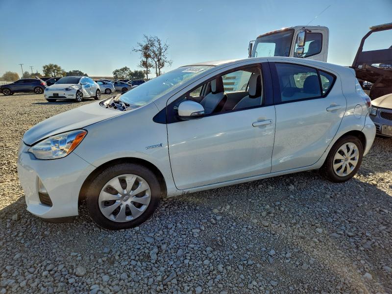 TOYOTA PRIUS C 2014 with VIN JTDKDTB33E1084614 - Photo from auction