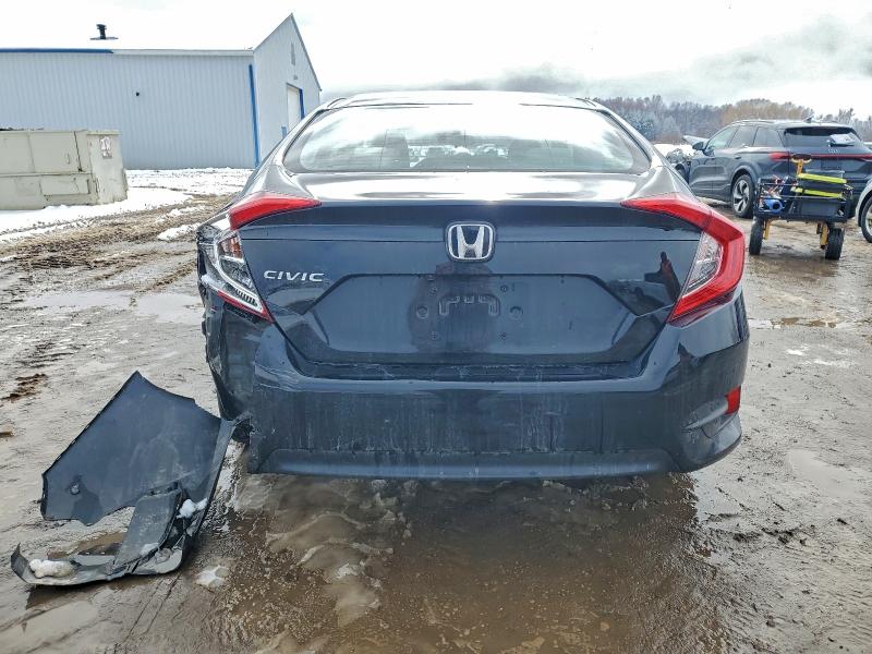 Photo 6 from auction – 2018 HONDA CIVIC LX with VIN 19XFC2F53JE022955