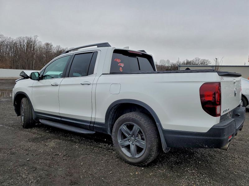 Photo 2 from auction – 2021 HONDA RIDGELINE with VIN 5FPYK3F72MB019747