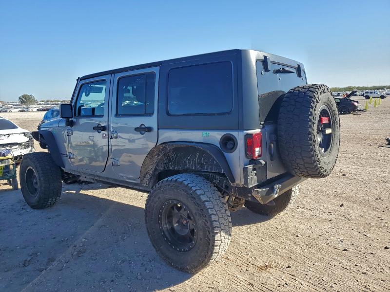 Photo 2 from auction – 2014 JEEP WRANGLER U with VIN 1C4BJWFG7EL115049