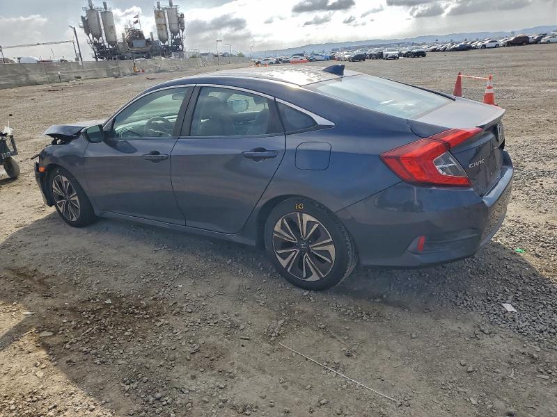 Photo 2 from auction – 2017 HONDA CIVIC EX with VIN 2HGFC1F32HH640356