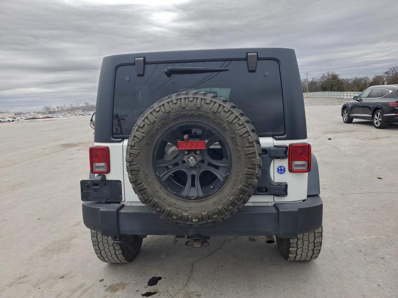 Photo 6 from auction – 2016 JEEP WRANGLER U with VIN 1C4BJWDG0GL303207