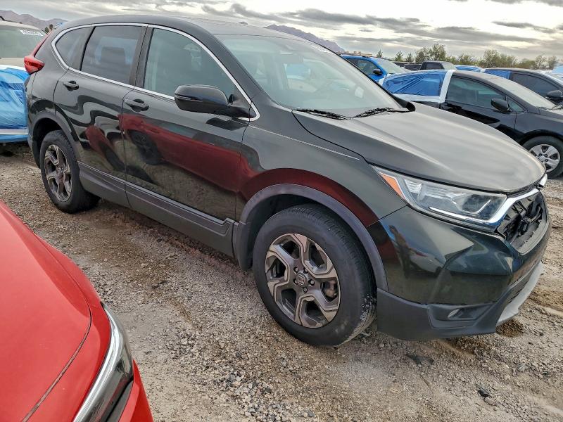 Photo 4 from auction – 2017 HONDA CR-V EX with VIN 2HKRW2H53HH673669
